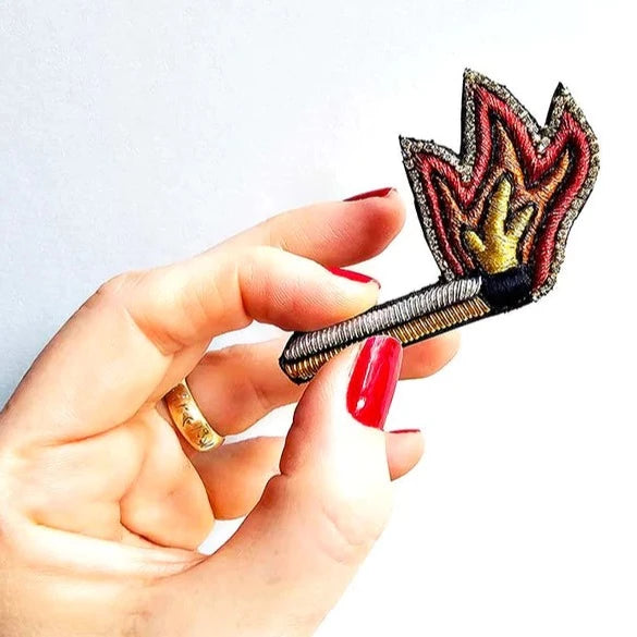 Broche lucifer