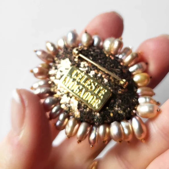 Broche oog amber