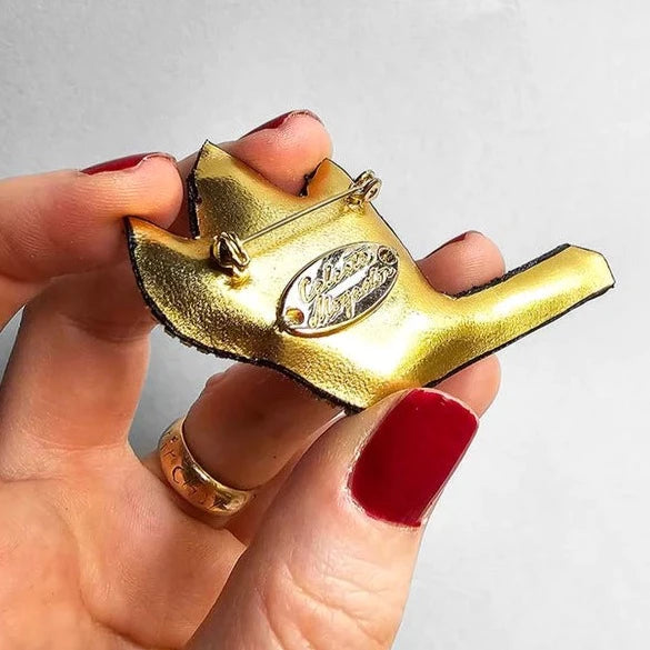 Broche lucifer
